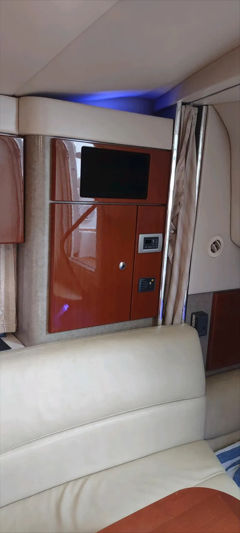 Slide: The Image of Interior of 2007 Formula 31 Cruiser with modern cabinetry and seating. - 22