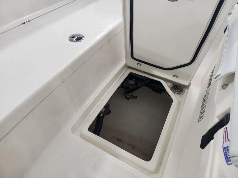 Slide: The Image of Open storage compartment on 2025 Pathfinder 2400 Open boat. - 12