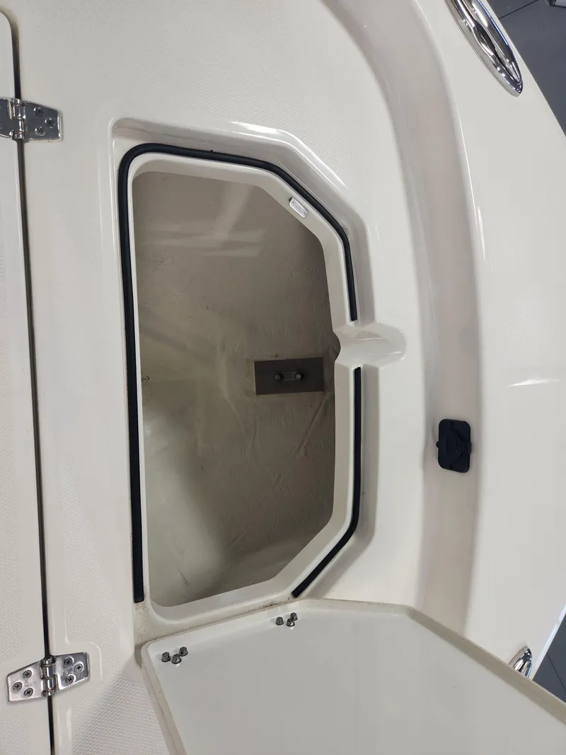 Slide: The Image of Open storage compartment on 2025 Pathfinder 2400 Open boat. - 13