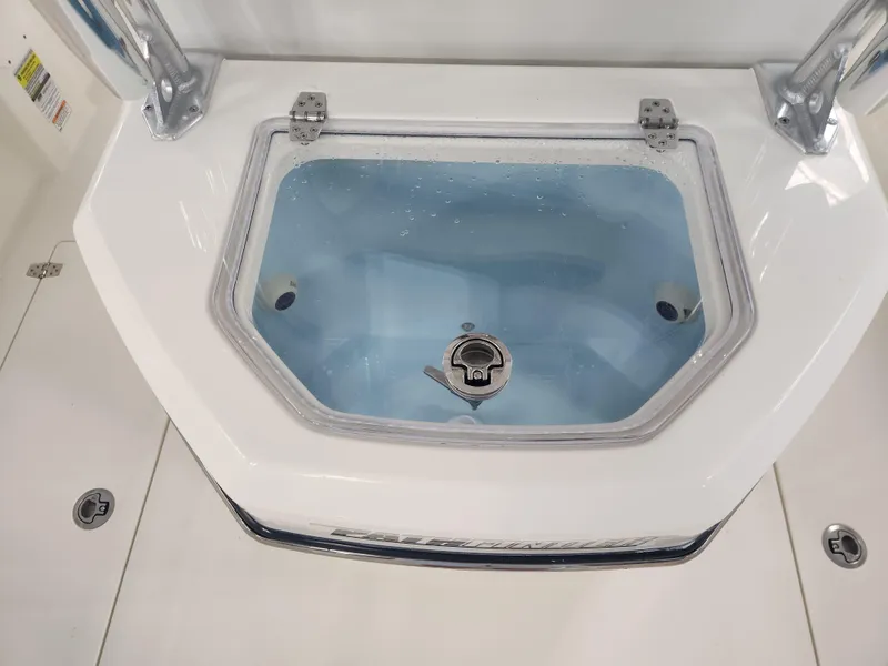 Slide: The Image of 2025 Pathfinder 2400 Open boat livewell with clear lid and water inside. - 25