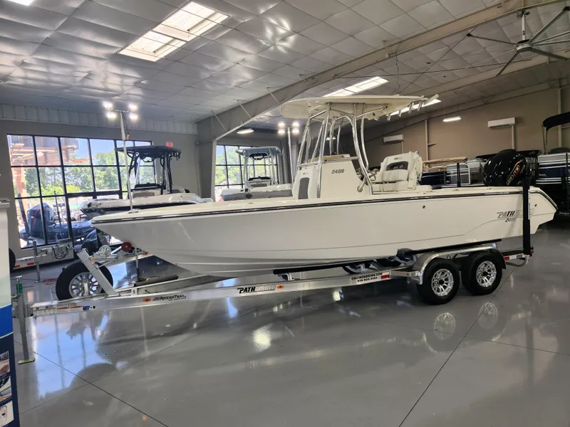 Slide: The Image of 2025 Pathfinder 2400 Open boat on trailer in showroom. - 3