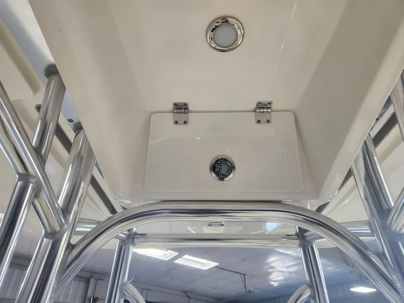 Slide: The Image of 2025 Pathfinder 2400 Open boat interior with stainless steel fixtures and ceiling light. - 30