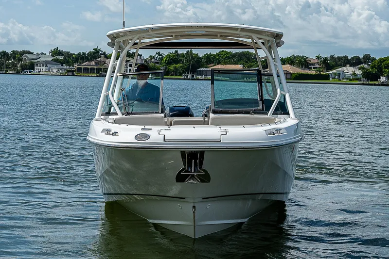 Slide: The Image of 2018 Boston Whaler 270 Vantage boat on calm water, front view. - 13