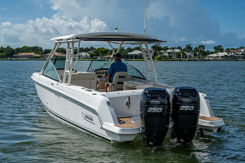 Slide: The Image of 2018 Boston Whaler 270 Vantage boat cruising on a sunny day. - 5