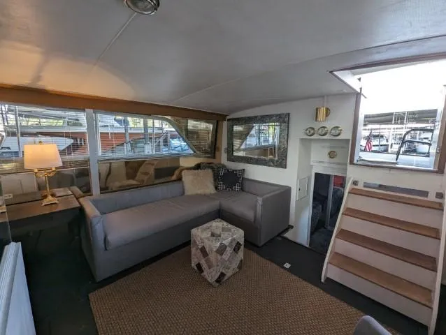 Slide: The Image of Interior of 1972 Chris-Craft 41 Commander with modern furnishings and natural light. - 16