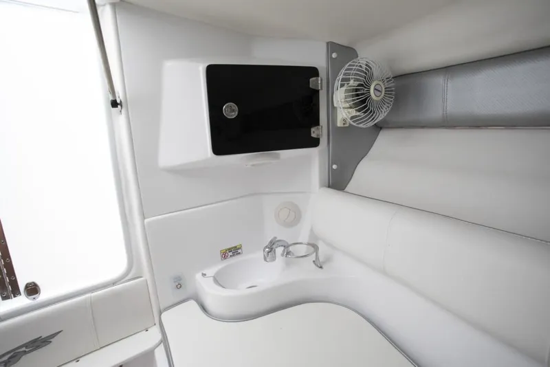 Slide: The Image of 2021 Glasstream 280 SCX boat on trailer under clear blue sky. - 13