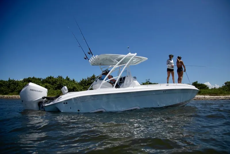 Slide: The Image of 2021 Glasstream 280 SCX boat on a trailer, showcasing sleek hull design. - 2