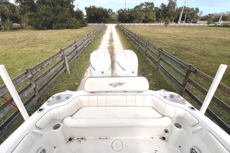 Slide: The Image of 2021 Glasstream 280 SCX boat with T-top, under a clear blue sky. - 22