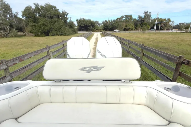 Slide: The Image of 2021 Glasstream 280 SCX boat interior with steering console and seating. - 23