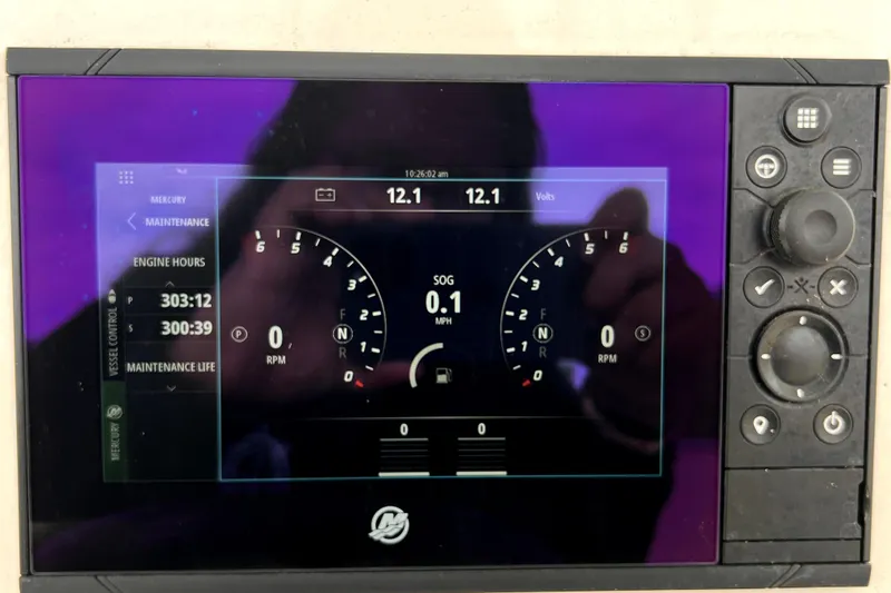 Slide: The Image of 2021 Glasstream 280 SCX boat cockpit with Garmin navigation and Mercury controls. - 27