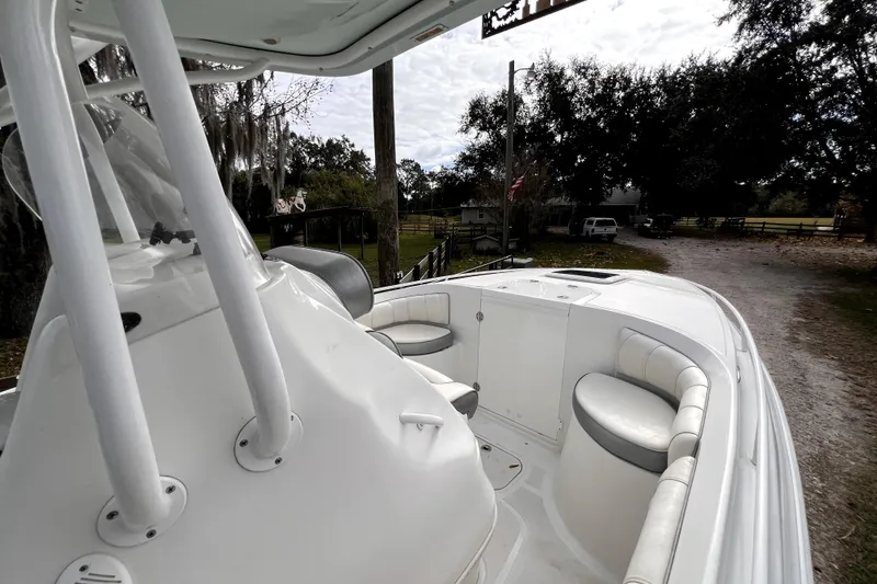 Slide: The Image of Active trim control panel on 2021 Glasstream 280 SCX boat dashboard. - 36