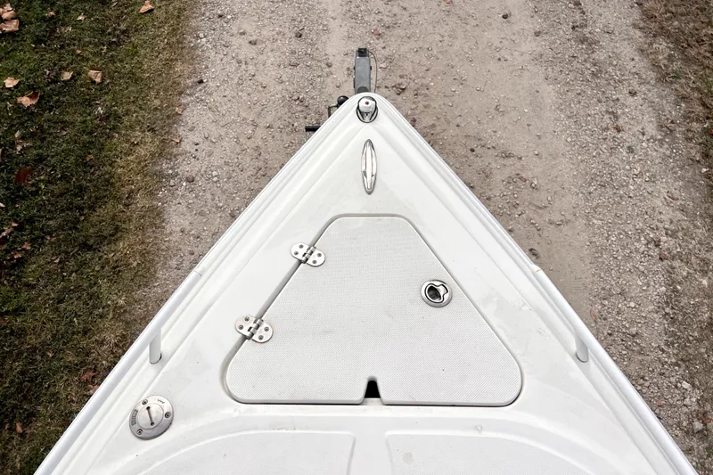 Slide: The Image of View from 2021 Glasstream 280 SCX boat cockpit, showcasing marina and clear blue sky. - 42