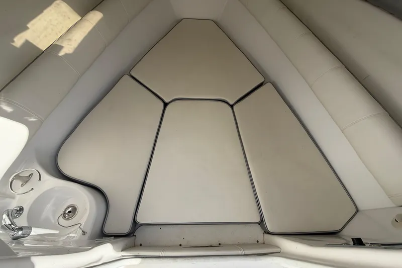 Slide: The Image of 2021 Glasstream 280 SCX boat interior with cushioned seating and cup holders. - 54