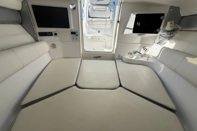 Slide: The Image of Interior of 2021 Glasstream 280 SCX boat with white seating and modern amenities. - 58