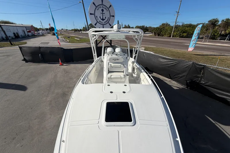 Slide: The Image of 2021 Glasstream 280 SCX boat displayed outdoors, showcasing sleek design and spacious deck. - 65