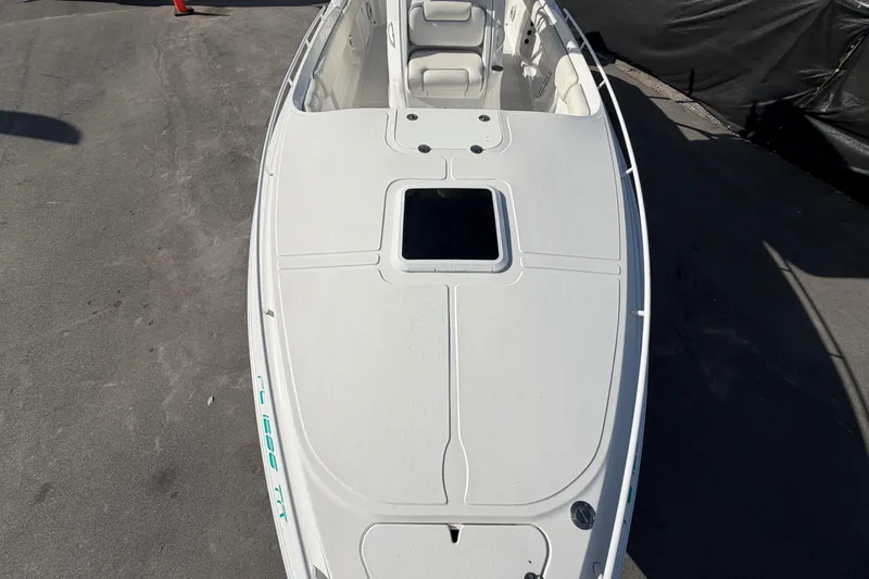 Slide: The Image of 2021 Glasstream 280 SCX boat, top view, showcasing spacious deck and seating. - 67