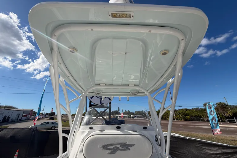 Slide: The Image of 2021 Glasstream 280 SCX boat with T-top under clear blue sky. - 71