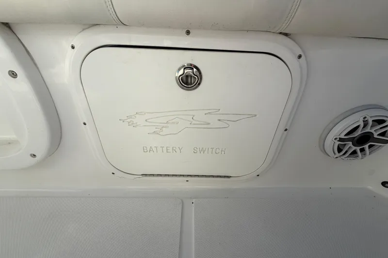 Slide: The Image of Battery switch compartment on 2021 Glasstream 280 SCX boat interior. - 90