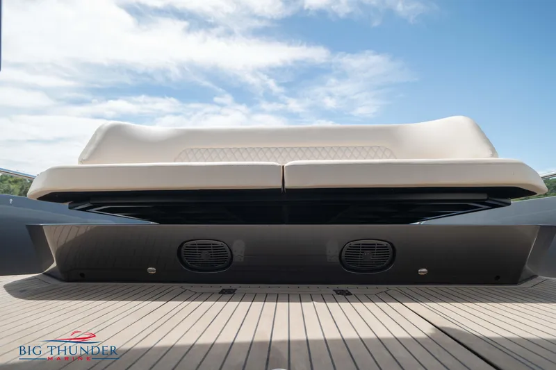 Slide: The Image of 2024 Dutch American Iconic DA 50 boat deck with cushioned seating and speakers. - 18