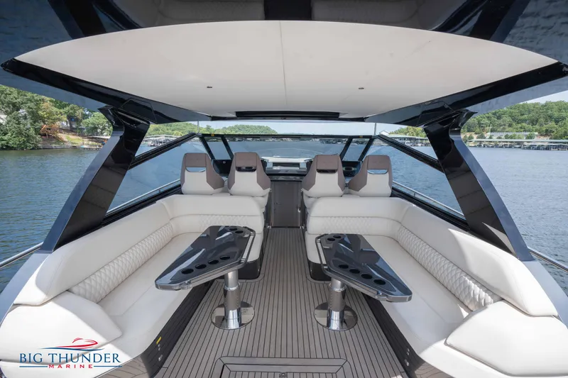 Slide: The Image of Luxurious 2024 Dutch American Iconic DA 50 yacht interior with sleek seating and scenic water view. - 22