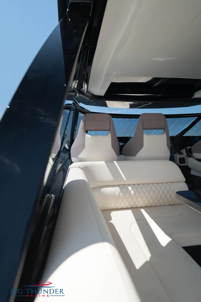 Slide: The Image of 2024 Dutch American Iconic DA 50 interior with sleek white seating. - 23
