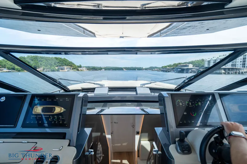 Slide: The Image of Interior view of 2024 Dutch American Iconic DA 50 yacht cockpit, overlooking serene waters. - 29