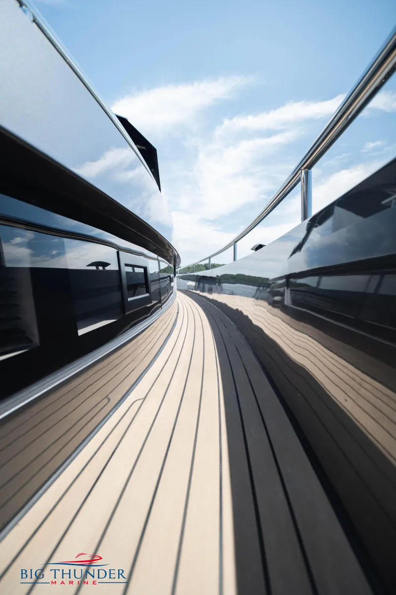 Slide: The Image of 2024 Dutch American Iconic DA 50 yacht deck with sleek design and reflective surfaces. - 31