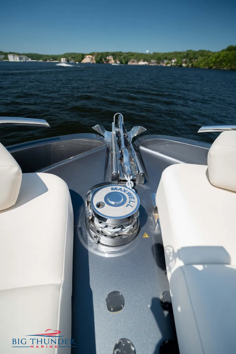 Slide: The Image of 2024 Dutch American Iconic DA 50 boat on a lake, featuring sleek design and luxurious seating. - 33