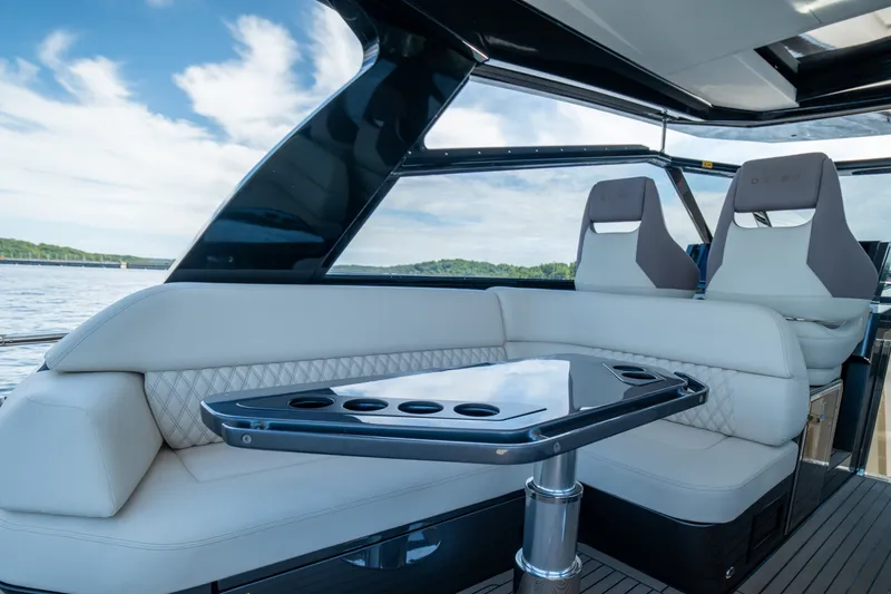 Slide: The Image of Luxurious interior of 2024 Dutch American Iconic DA 50 yacht with plush seating and sleek table. - 27