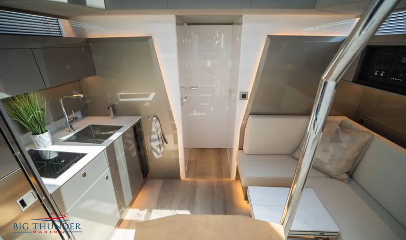 Slide: The Image of Luxurious interior of 2024 Dutch American Iconic DA 50 yacht with modern kitchen and seating area. - 37