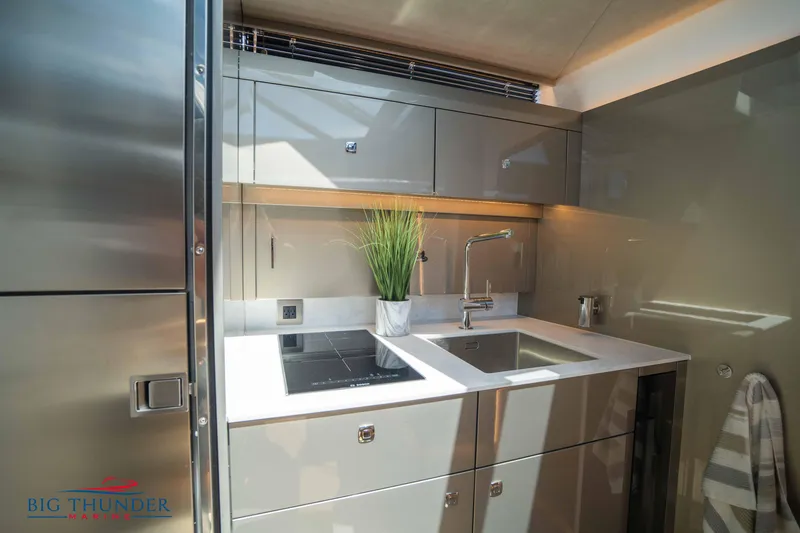 Slide: The Image of Modern kitchen in 2024 Dutch American Iconic DA 50 yacht, featuring sleek cabinetry and appliances. - 38