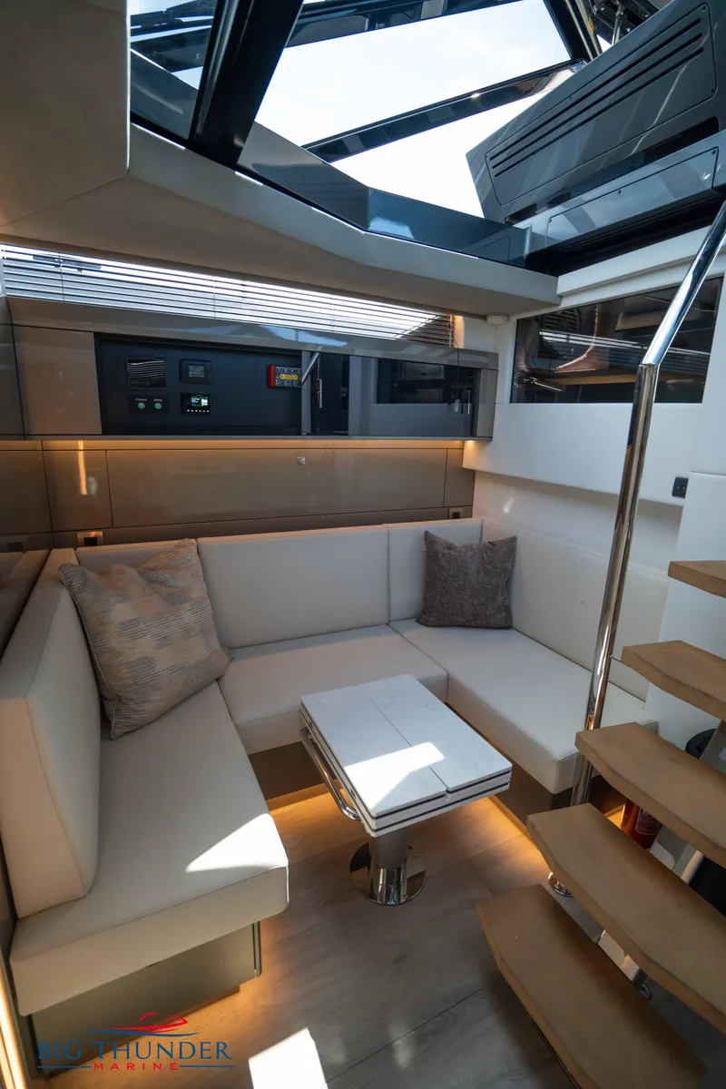 Slide: The Image of Luxurious interior of 2024 Dutch American Iconic DA 50 yacht with modern seating and skylight. - 45