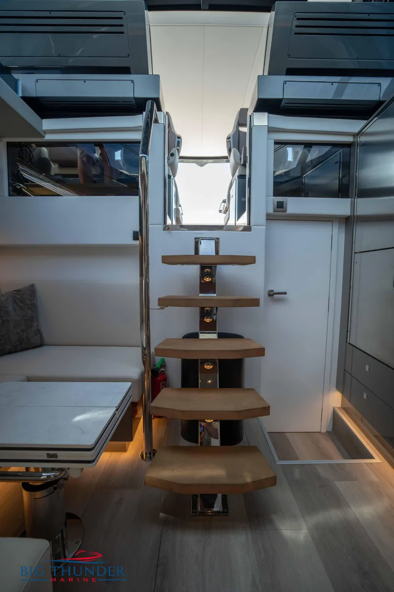 Slide: The Image of Interior of 2024 Dutch American Iconic DA 50 yacht with modern staircase and seating area. - 46