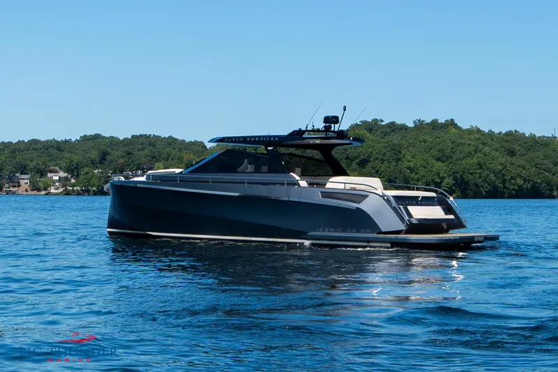 Slide: The Image of 2024 Dutch American Iconic DA 50 yacht on a serene lake. - 5
