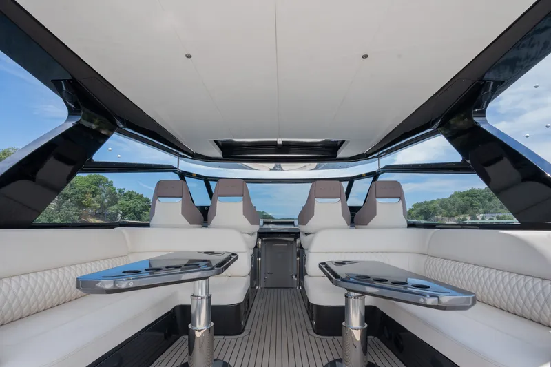 Slide: The Image of Luxurious interior of 2024 Dutch American Iconic DA 50 yacht with modern seating and tables. - 17