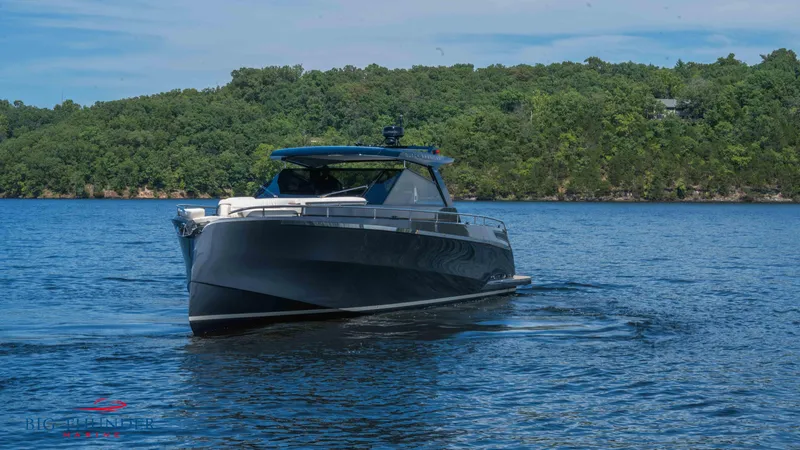 Slide: The Image of 2024 Dutch American Iconic DA 50 yacht cruising on a serene lake. - 7