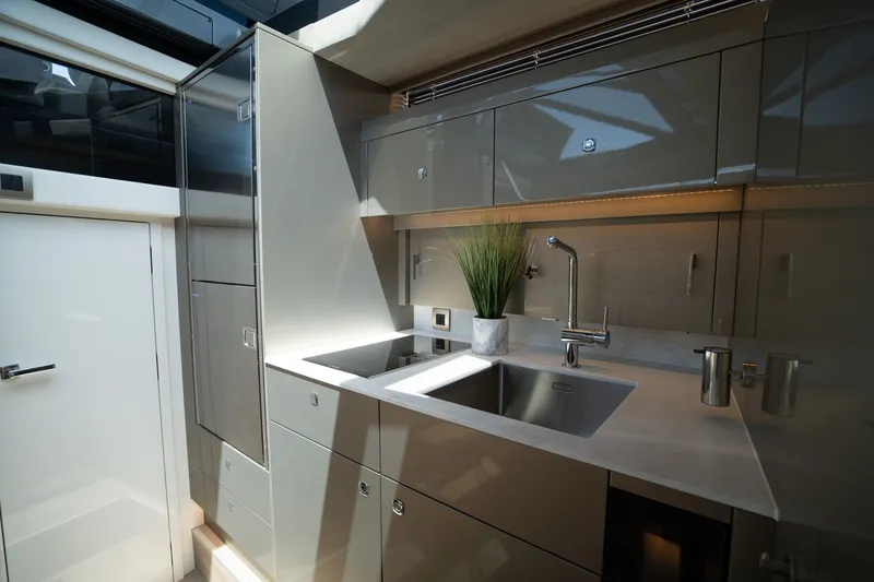 Slide: The Image of Modern kitchen interior of 2024 Dutch American Iconic DA 50 yacht, featuring sleek cabinetry and fixtures. - 34