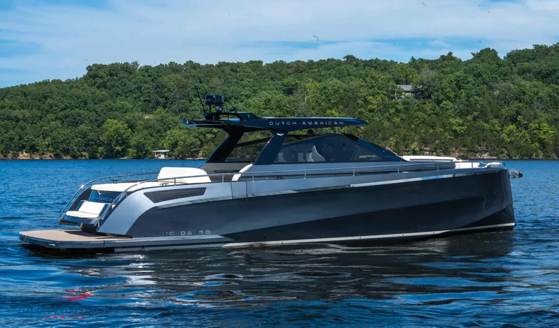 Slide: The Image of 2024 Dutch American Iconic DA 50 yacht on a serene lake. - 8