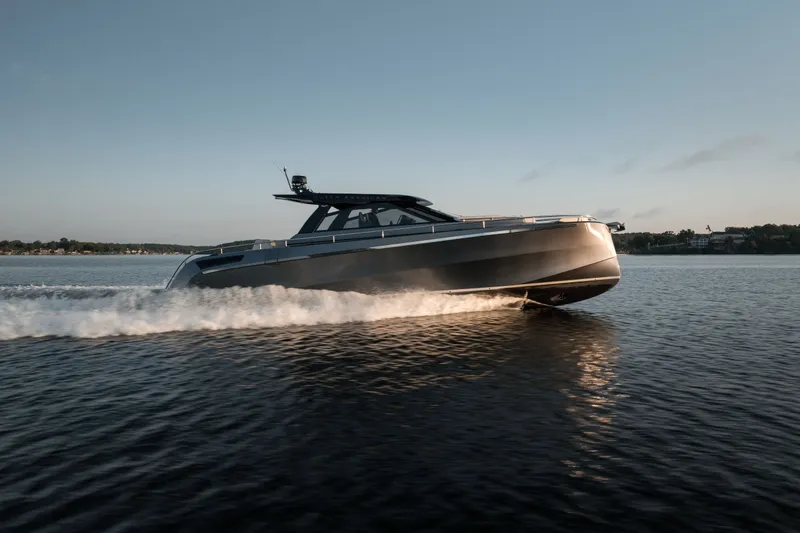 The Image of 2024 Dutch American Iconic DA 50 yacht cruising on calm waters at sunset. - 1