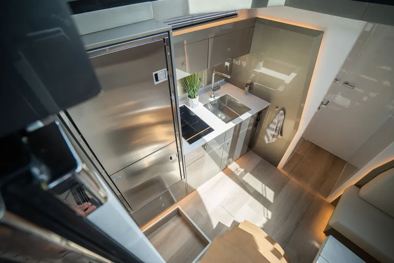 Slide: The Image of Modern kitchen interior in 2024 Dutch American Iconic DA 50 yacht, featuring sleek design and stainless appliances. - 23