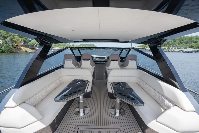 Slide: The Image of Luxurious 2024 Dutch American Iconic DA 50 yacht interior with elegant seating and scenic water view. - 18