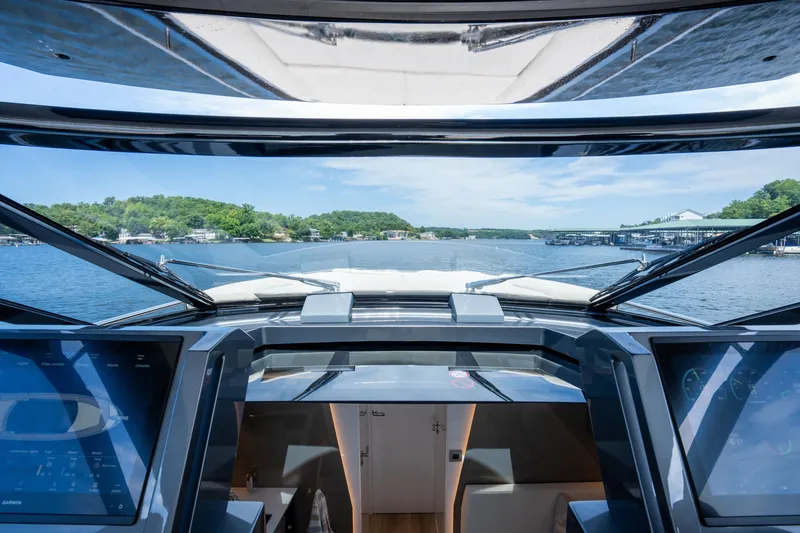 Slide: The Image of 2024 Dutch American Iconic DA 50 yacht cockpit with scenic waterway view. - 14