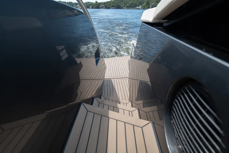 Slide: The Image of Sleek 2024 Dutch American Iconic DA 50 yacht with modern deck design on open water. - 22