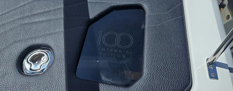 Slide: The Image of 2025 Nautique Super Air Nautique G23 Centennial Edition emblem on textured surface. - 19