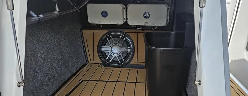 Slide: The Image of 2025 Nautique Super Air Nautique G23 interior with premium sound system and sleek design. - 24