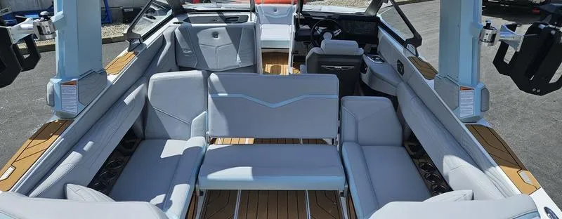 Slide: The Image of 2025 Nautique Super Air Nautique G23 interior with spacious seating and modern design. - 36