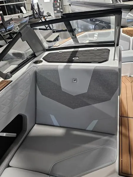 Slide: The Image of 2025 Nautique Super Air Nautique GS20 interior with modern seating and sleek design. - 4