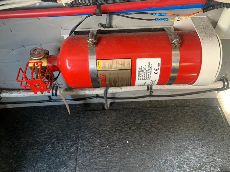 Slide: The Image of Fire extinguisher mounted in 2018 Crownline 264 CR boat interior. - 41