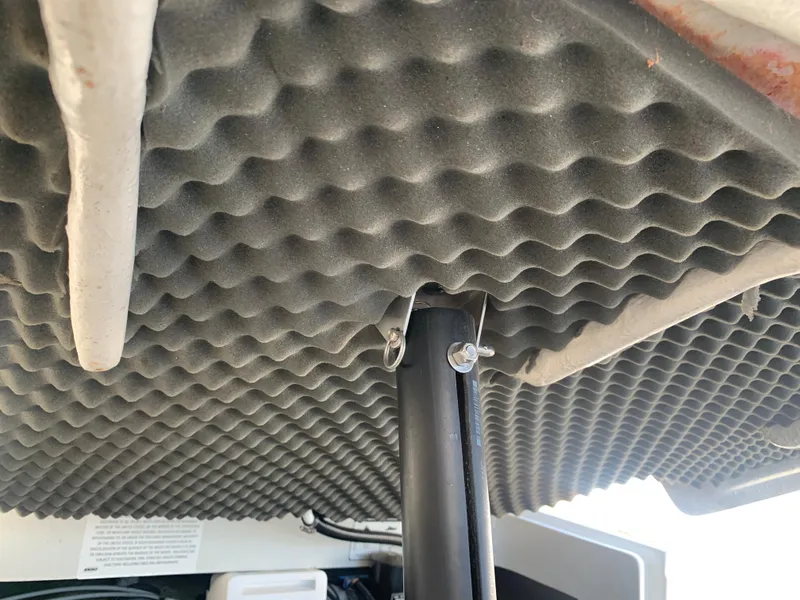 Slide: The Image of 2018 Crownline 264 CR boat interior with acoustic foam and support pole. - 45