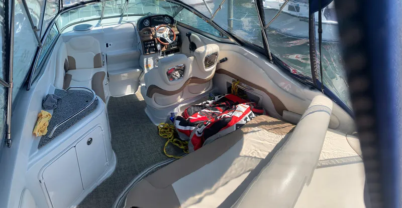 Slide: The Image of 2018 Crownline 264 CR boat interior with seating and dashboard. - 5